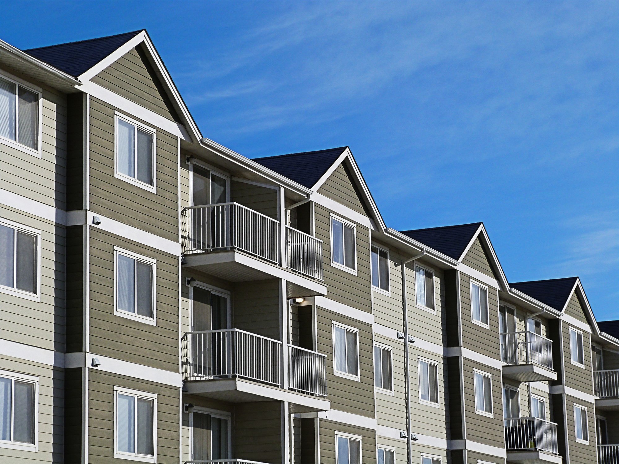 Apartment Complex With Blue Sky